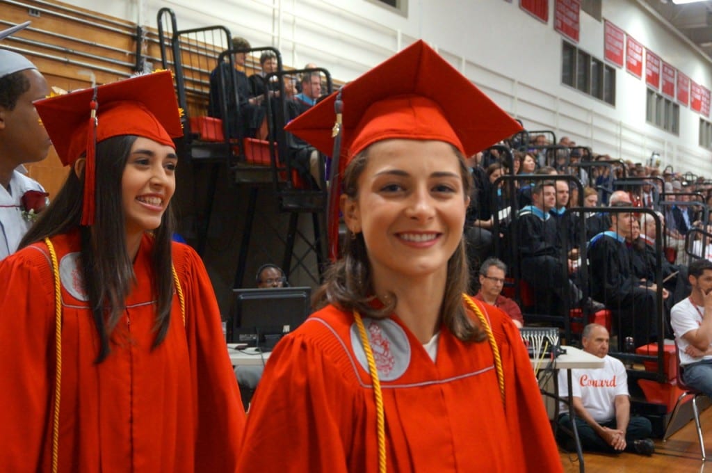 Jackie Palermo and Becky Palma wait to receive their diplomas. Conard High School graduation. June 15, 2015. Photo credit: Ronni Newton