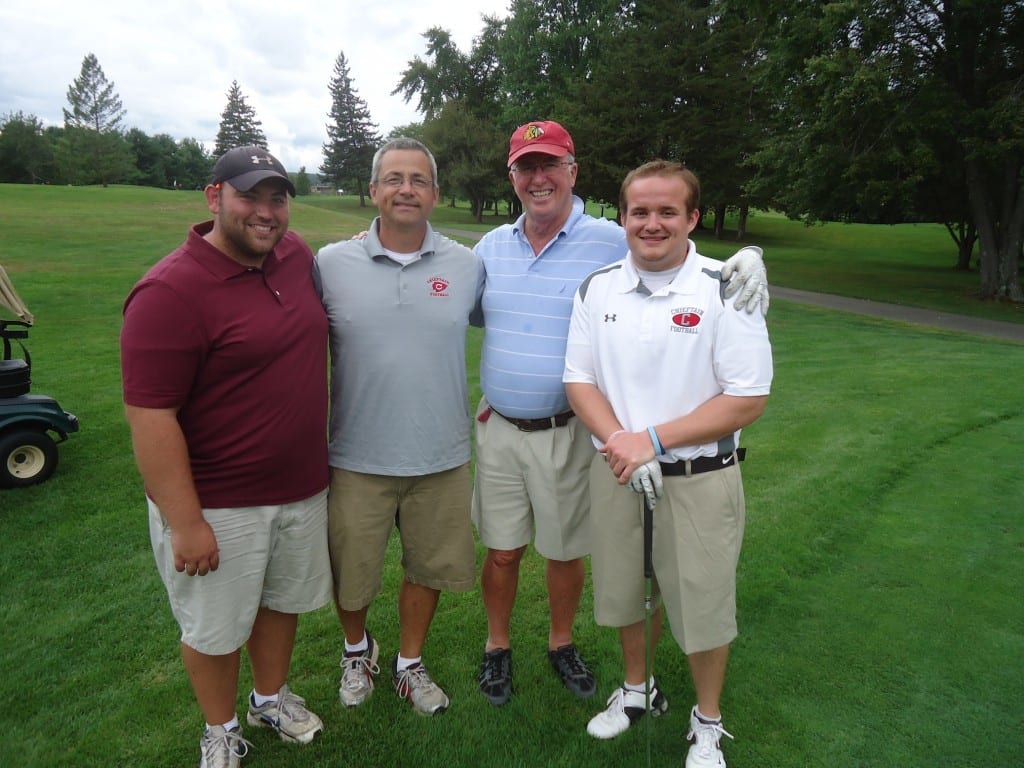 From left: Michael McCarthy (assistant coach), Steve Garneau (assistant coach), Craig Nation (Class of '60), James Redman (assistant coach) at first annual Bob McKee Classic. Submitted photo