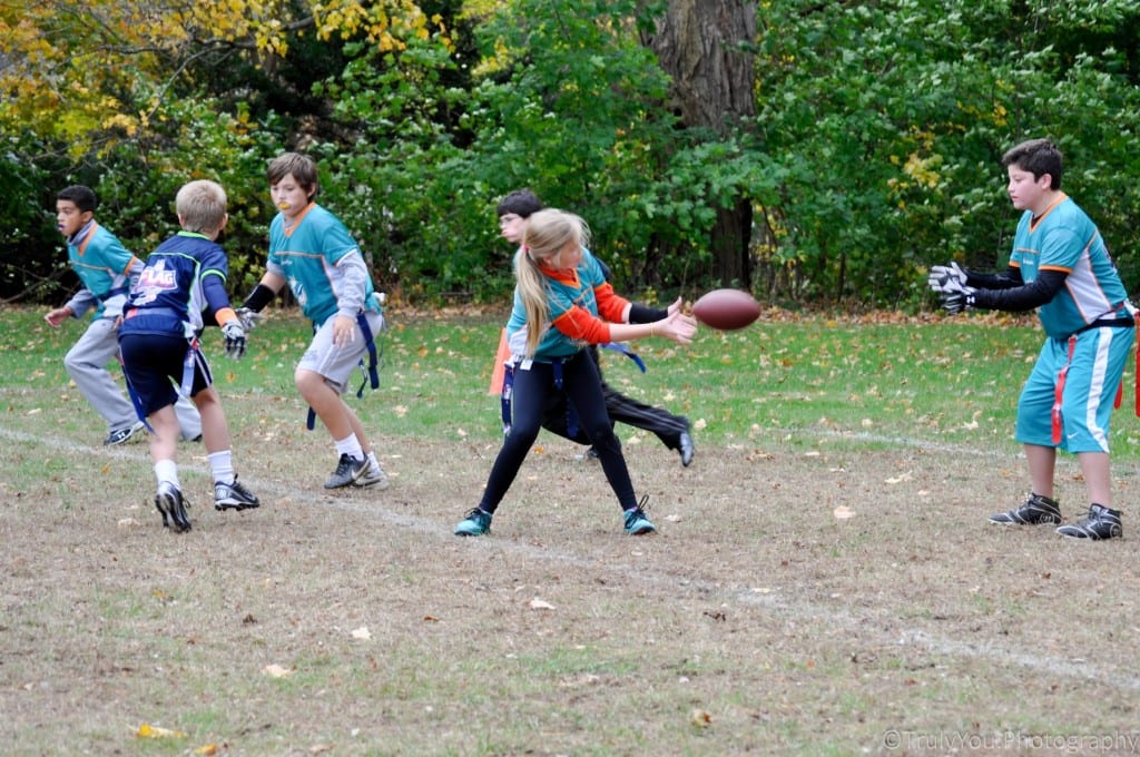 Sarah Hicks hikes the ball to TJ Wang as their fellow Miami Dolphins team members Jadyn Green, Griffin Frauenhofer, and Jack O’Donnell run to stay away from defender Noah Walton of the Seattle Seahawks. Submitted photo