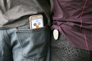 A Wearsafe Tag can easily clip onto a pocket. It connects with an iPhone that is in the range of 200 feet. Courtesy of Wearsafe