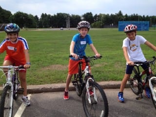 Kids triathlon participants prepare for the bike portion of the race. Submitted photo