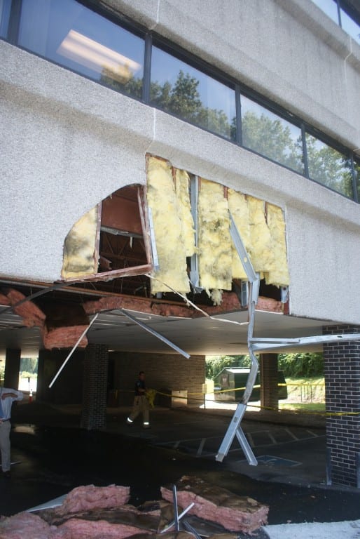 A Department of Corrections van damaged this building at 65 Kane St., West Hartford on Monday. Photo courtesy of West Hartford Police