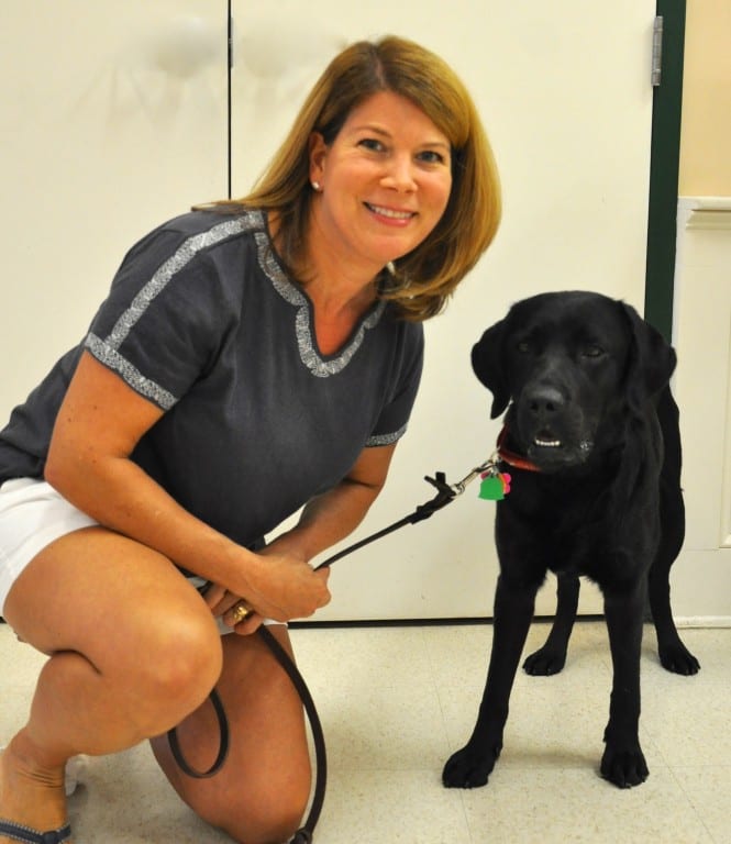 Bristow Middle School teacher Ashley Kneidel and her future guide dog, Debra. Submitted photo
