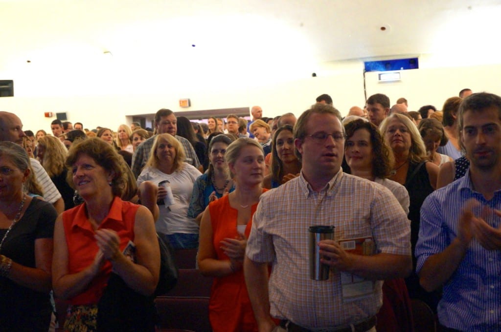 Teachers give a round of applause for speakers at the 2015 convocation. Photo credit: Ronni Newton