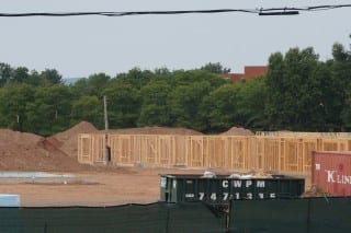 The first phase of the 150-unit apartment complex at 243 Steele Rd. is being framed. Photo credit: Ronni Newton
