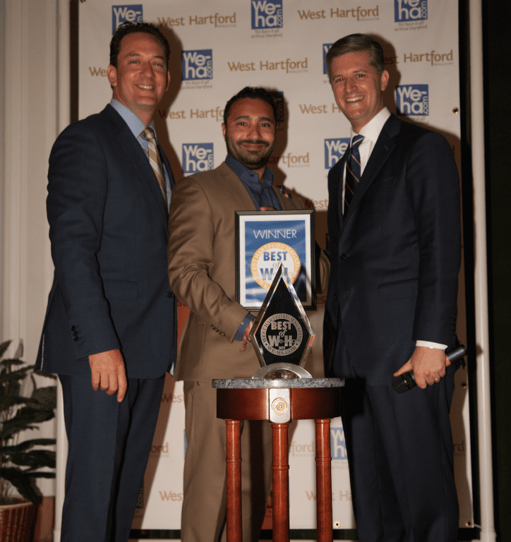 Best Men's Fashion: Daswani Clothiers. M.J. Daswani, co-owner with NBC Connecticut's Brad Drazen and Mayor Scott Slifka at the Best of West Hartford Awards Show, September 10 2015. Photo by Mick Melvin