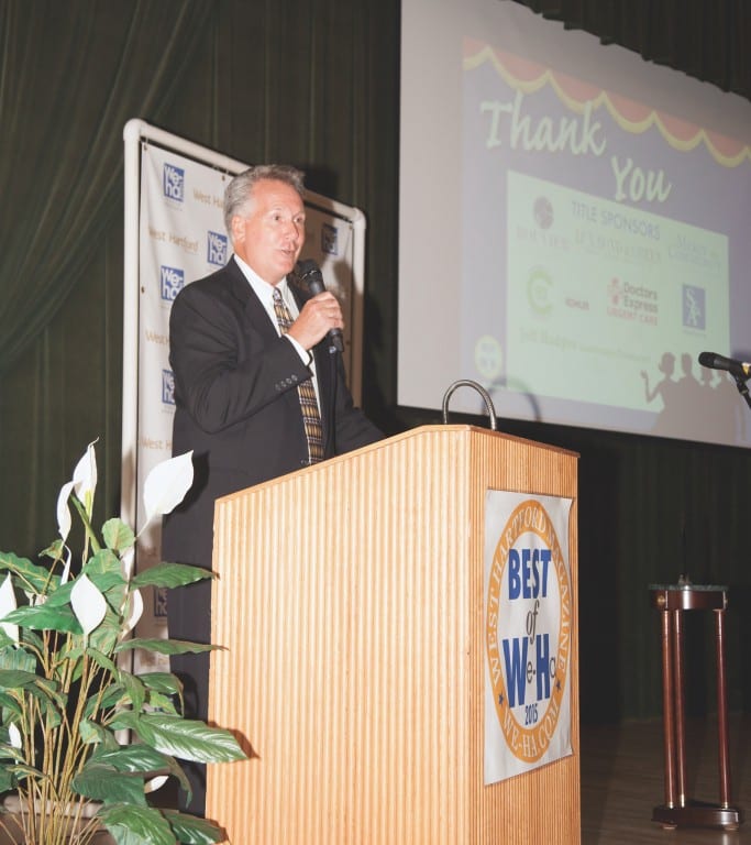 Tom Hickey, of West Hartford Magazine and We-Ha.com, kicks off the first ever Best of West Hartford Awards Show, September 10, 2015 at West Hartford Town Hall. photo by Mick Melvin