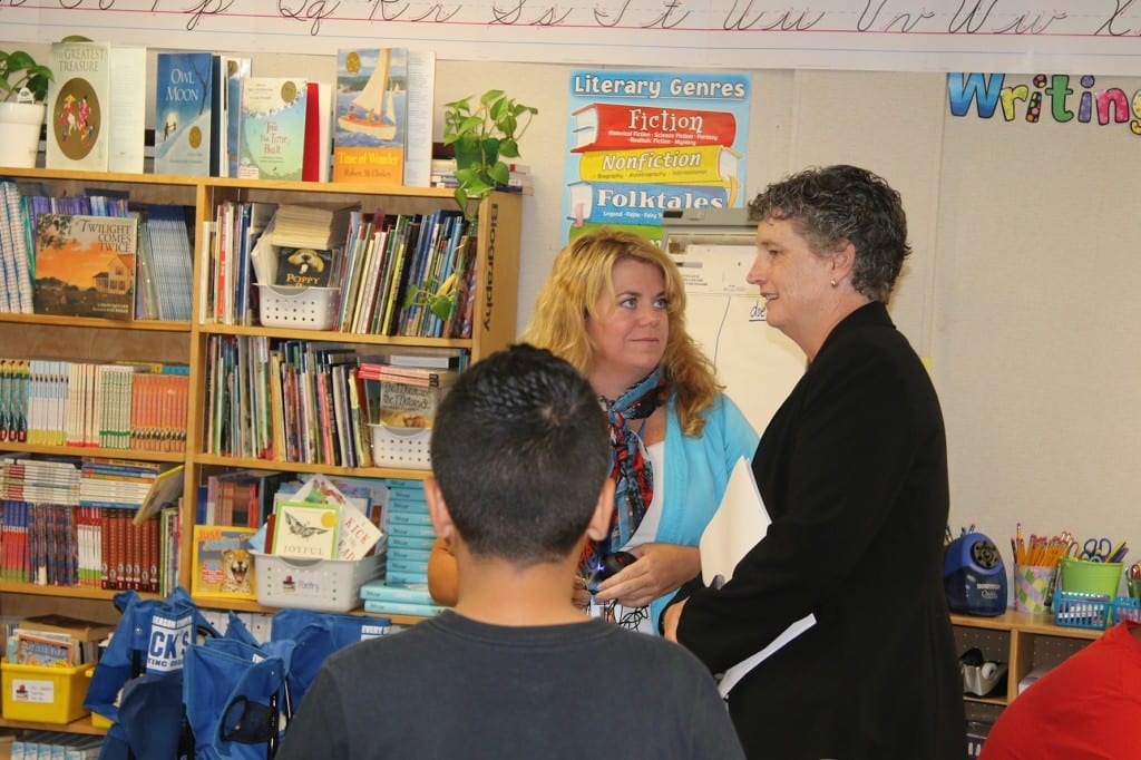 State Senator Beth Bye (D-West Hartford) talks with Wolcott Elementary School 5th-grade teacher Jennifer Stanish about increased state education aid for West Hartford and smaller class sizes. Submitted photo