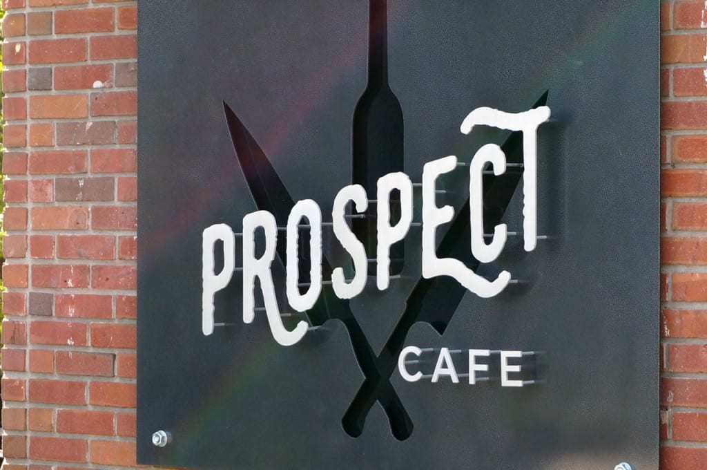 The Prospect Café logo is displayed on the exterior of the building. Photo credit: Ronni Newton