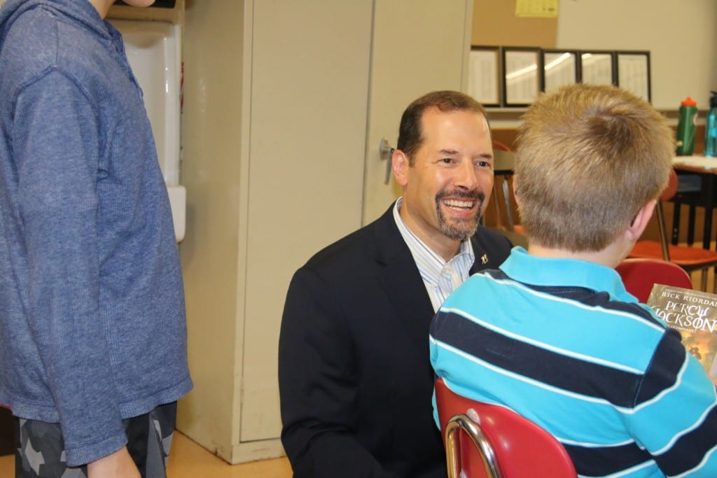 State Representative Andy Fleischmann(D-West Hartford) chats with a 5th-grade student at the Wolcott Elementary School during a recent visit to check on class sizes. Submitted photo