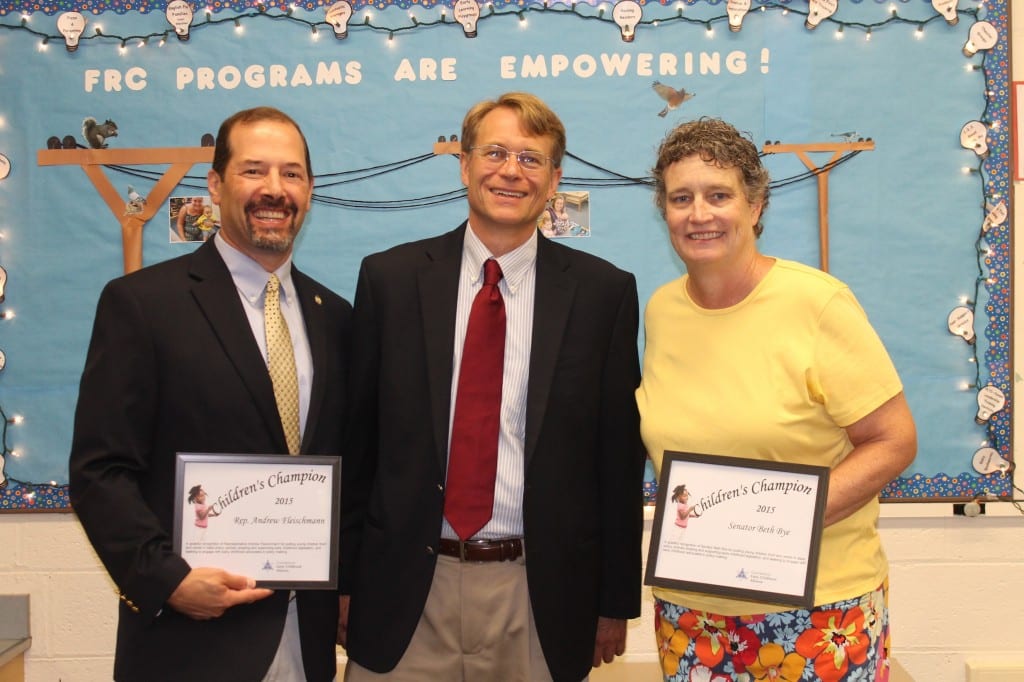 Rep. Andrew Fleischmann (left) and Sen. Beth Bye were presented with their Children's Champions Awards by Merrill Gay of the CT Early Childhood Alliance. The presentation took place on Sept. 8 in West Hartford. Photo courtesy of the CT Early Childhood Alliance. Submitted photo