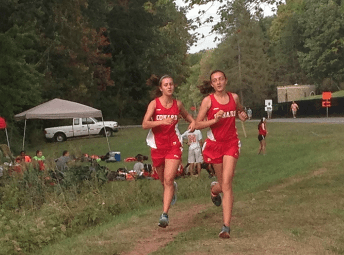 Emma Oriol (left) and Nora Dynowski took third and fourth places in the XC meet on Sept. 29. Photo courtesy of Linda Geisler