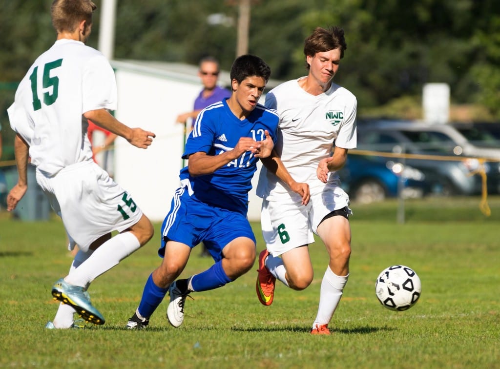 Hall senior captain AJ Speranza battles for control of the ball during a game against Northwest Catholic on Sept. 16. Photo courtesy of David B. Newman, photobynewman.com