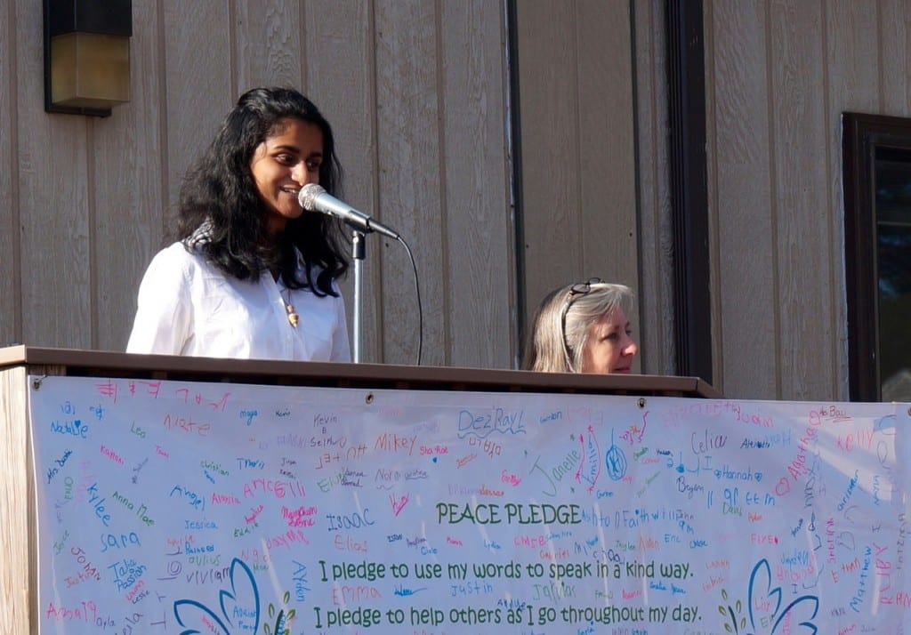 Conard student Mughda Gurram speaks to the Charter Oak International Academy about how peace-making can start in small ways. Photo credit: Ronni Newton