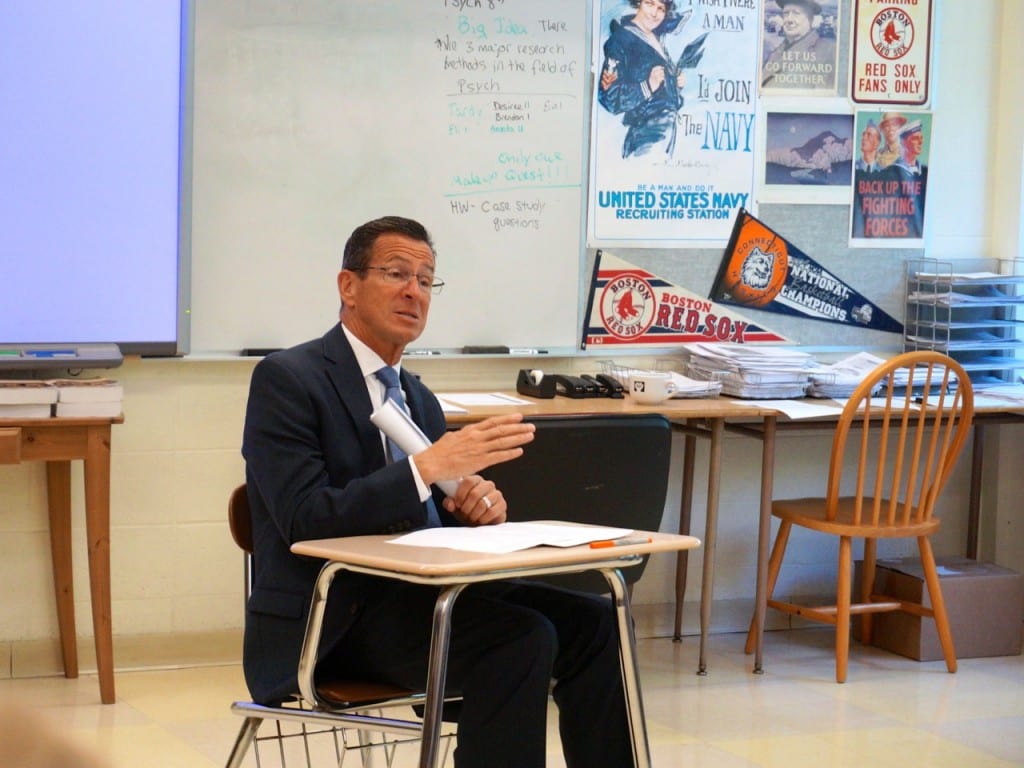Gov. Dannel P. Malloy sits down with students in Christopher Islaub's AP U.S. History class. Photo credit: Ronni Newton