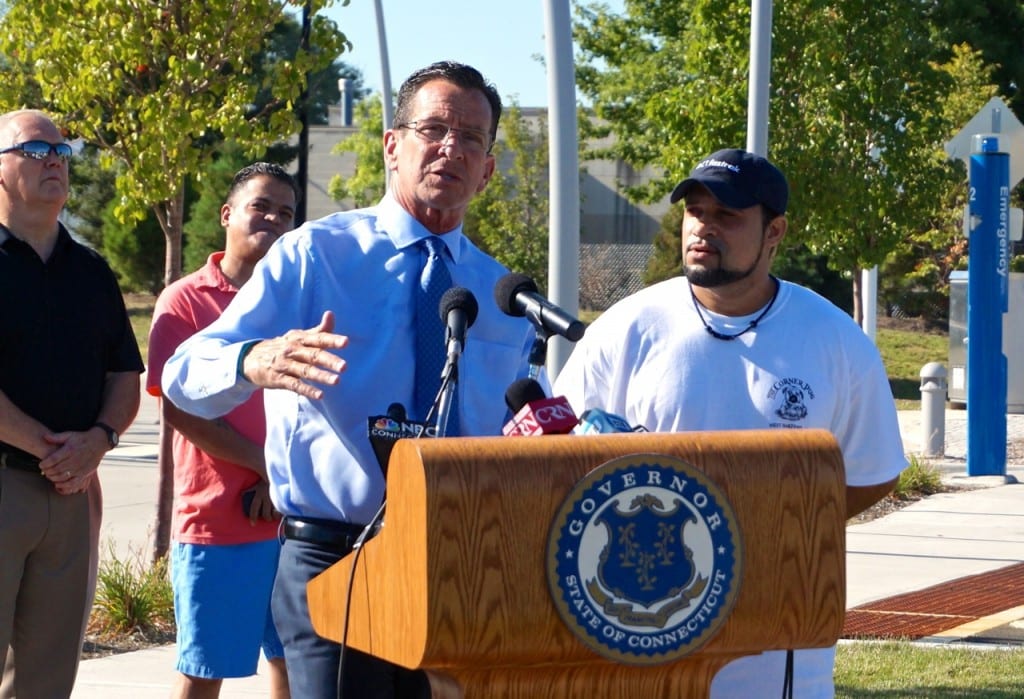 Gov. Dannel P. Malloy with Corner Pug employee John Colon (right) at the celebration of CTfastrak's millionth rider on Sept. 9, 2015 at the Flatbush Avenue station in West Hartford. Photo credit: Ronni Newton