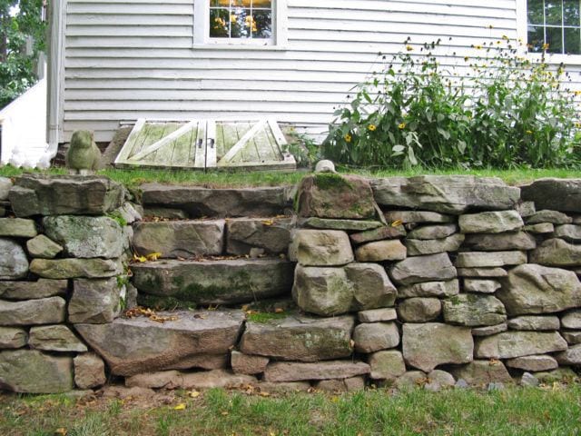 Stone steps on side of house leading to bulkhead. Photo credit: Deb Cohen
