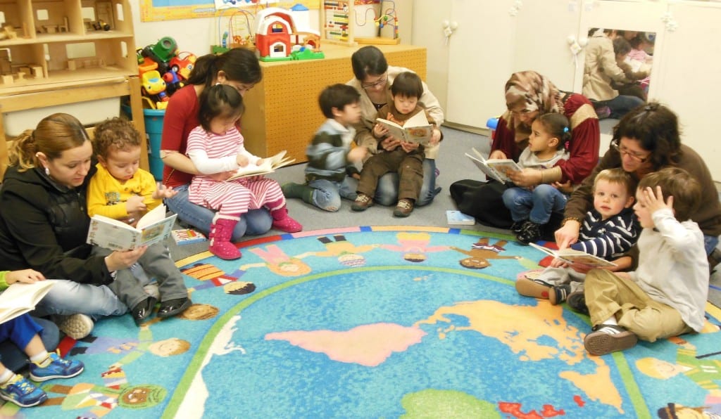 Children and their caregivers enjoy Baby Bookworms. The program will be offered again beginning Oct. 21. Submitted photo