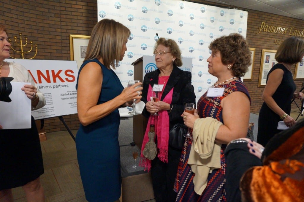 Katie Couric chats with guests. Photo credit: Ronni Newton
