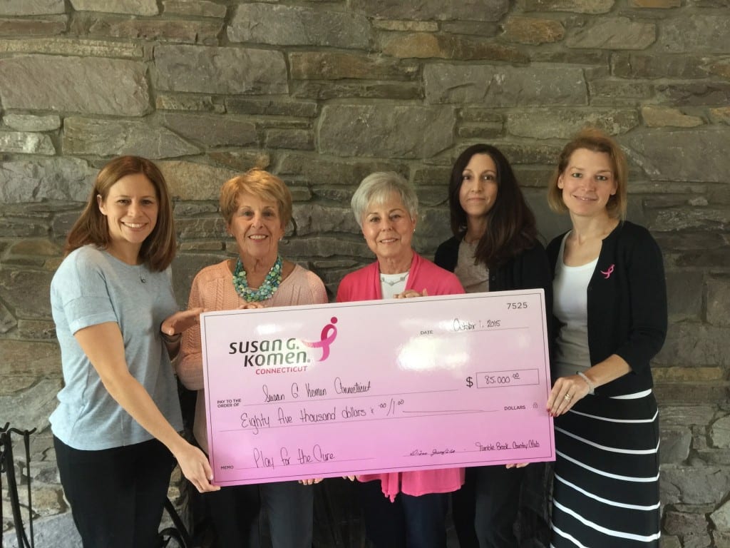 L to R: Monica Gold, Diane Greenfield, Amy Levin, and Denise Delaney present Nicole Marohn, Development Director for Susan G. Komen Connecticut, with a check for $85,000, proceeds from Tumble Brook Country Club's Play for a Cure. Submitted photo