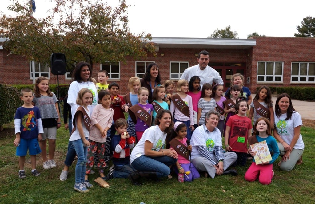 Dorjan Puka, owner and executive chef of Treva and A'Vert (back row in chef coat) poses with Webster Hill Girl Scouts, State Sen. Beth Bye, and GGS representative at the Oct. 22 farmers' market. Photo credit: Ronni Newton