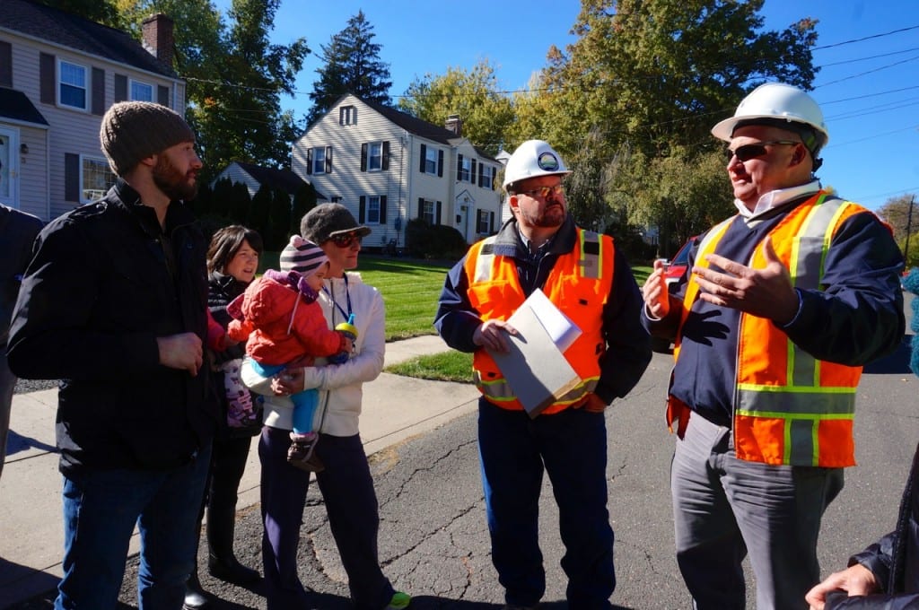 Department of Public Works Director John Phillips (right) speaks with DEEP Project Manager Dan Biron and residents on Monday morning. Photo credit: Ronni Newton