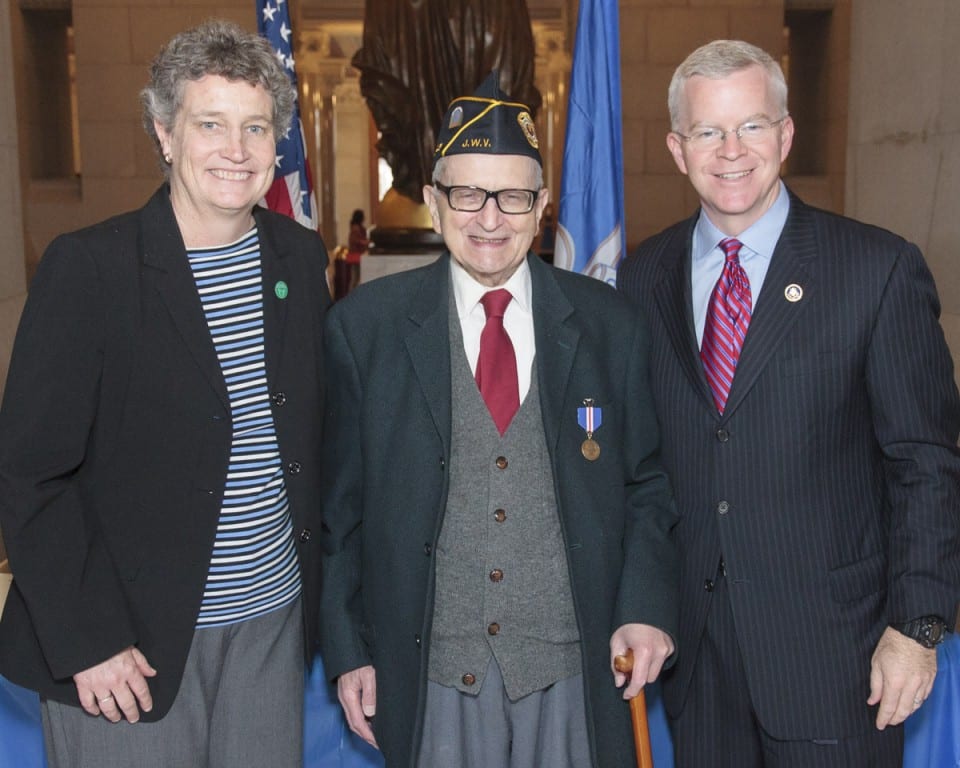 Herbert Max stands with Senator Beth Bye and Department of Veterans’ Affairs Commissioner Sean Connolly after being presented with the Connecticut Wartime Service Medal at a ceremony at the State Capitol in Hartford organized by Senator Bye. Over two dozen armed services veterans from West Hartford were given the medal that honors Connecticut veterans with qualifying wartime military service. (November 19, 2015) Submitted photo