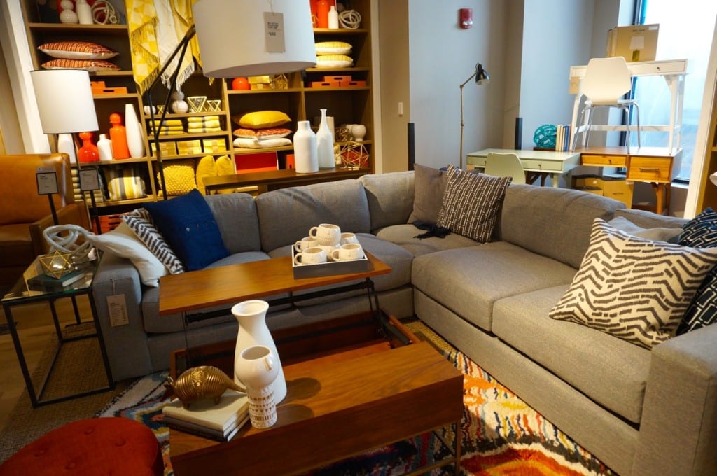A coffee table with an adjustable top perfect for a laptop or plate of food is featured at West Elm, Blue Back Square, West Hartford. Photo credit: Ronni Newton