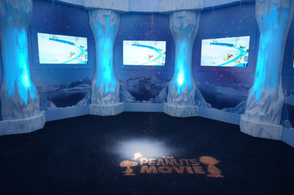 The interior of the 30-foot Ice Palace dome featured falling snow, a light show, and scenes from 'The Peanuts Movie.' Photo credit: Ronni Newton