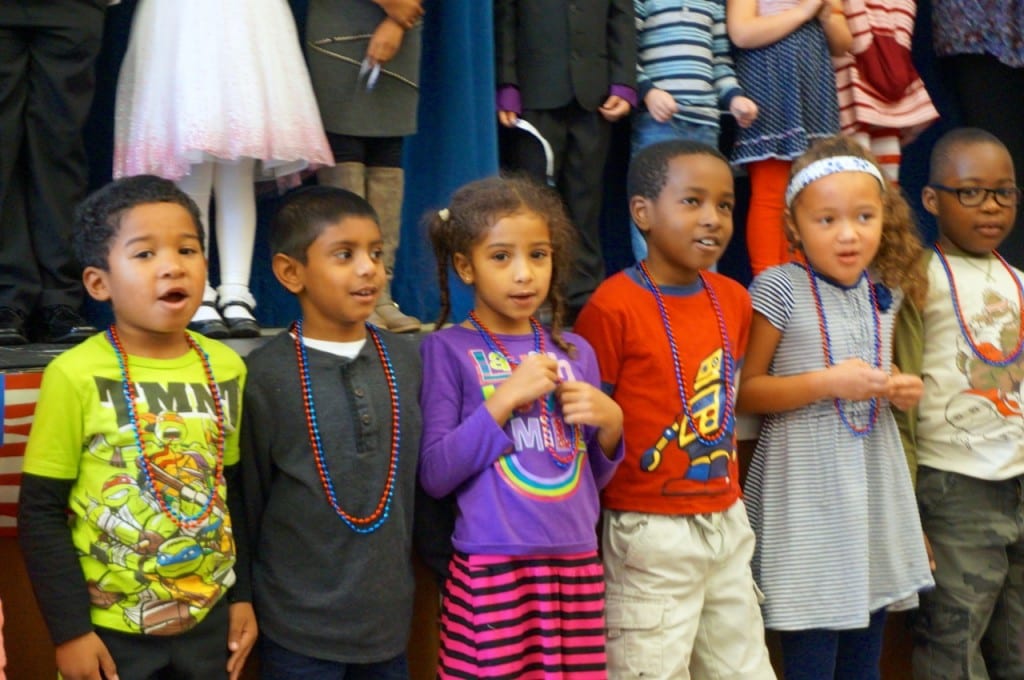 Students in Dawn Hyland's first grade class sing "Veterans We Thank You." Veterans Day 2015. Photo credit: Ronni Newton