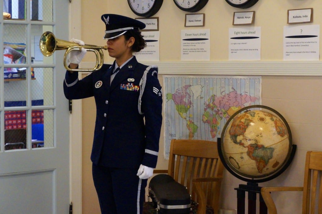 Taps is sounded on a bugle. Veterans Day 2015. Photo credit: Ronni Newton