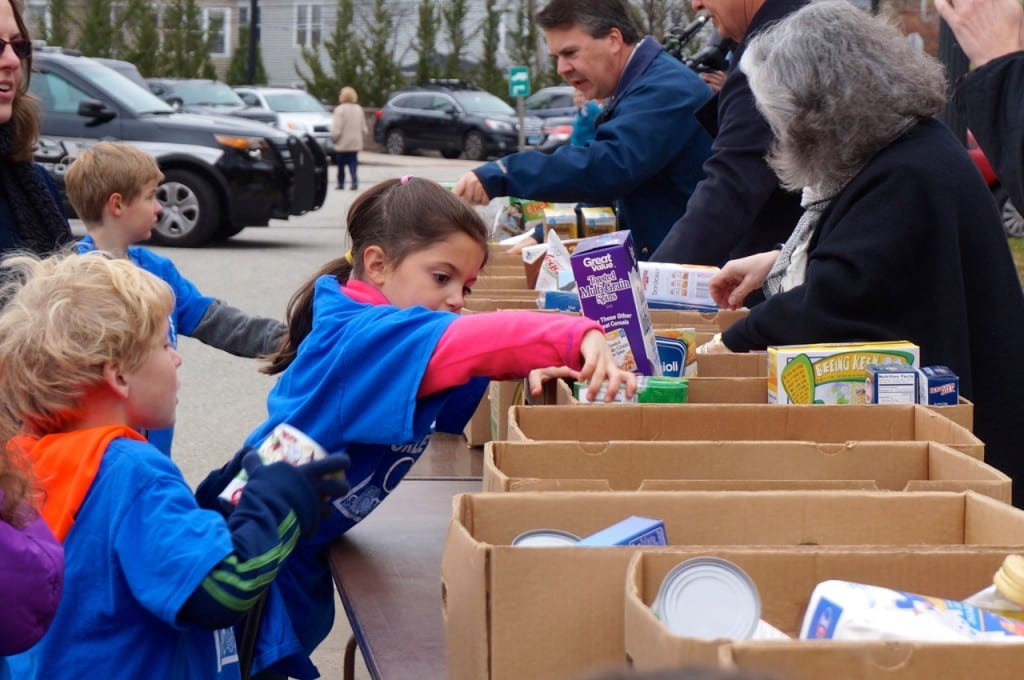 Students unload their wagons outside West Hartford Town Hall. Morley Red Wagon Food Drive, Nov. 18, 2015. Photo credit: Ronni Newton