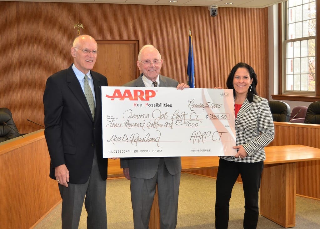 Jim Doran (center) receives the Andrus Award. He is flanked by Seniors Job Band President Bob Cave (left) and AARP CT Executive Director Nora Duncan. Submitted photo
