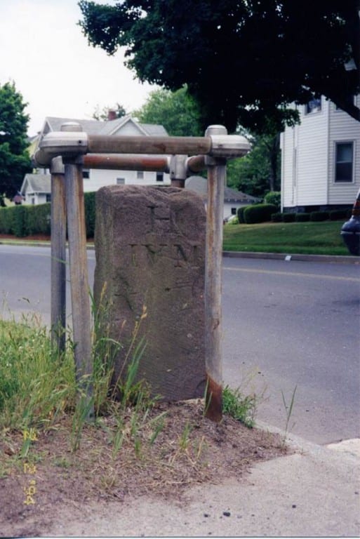 An 18th century mile marker inscribed with the letters “H IV M” has stood on the corner of Four Mile Road and Farmington Avenue for centuries. This marker indicates the four-mile point from that spot to the Old State House in Hartford. Four Mile Road was named not for its length, but for the marker at its head. Submitted photo