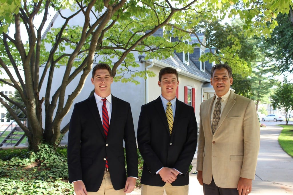Kingswood Oxford Head of School Dennis Bisgaard (right) congratulates Austin Lemkuil (center) and Andrew Lemkuil for winning the Barnes Service Award from the WALKS Foundation. Submitted photo