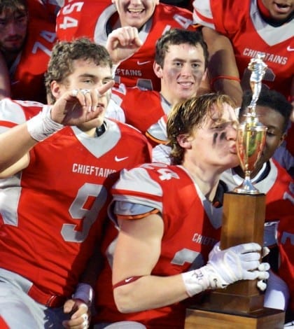 bobby kissing mayor’s cup trophy