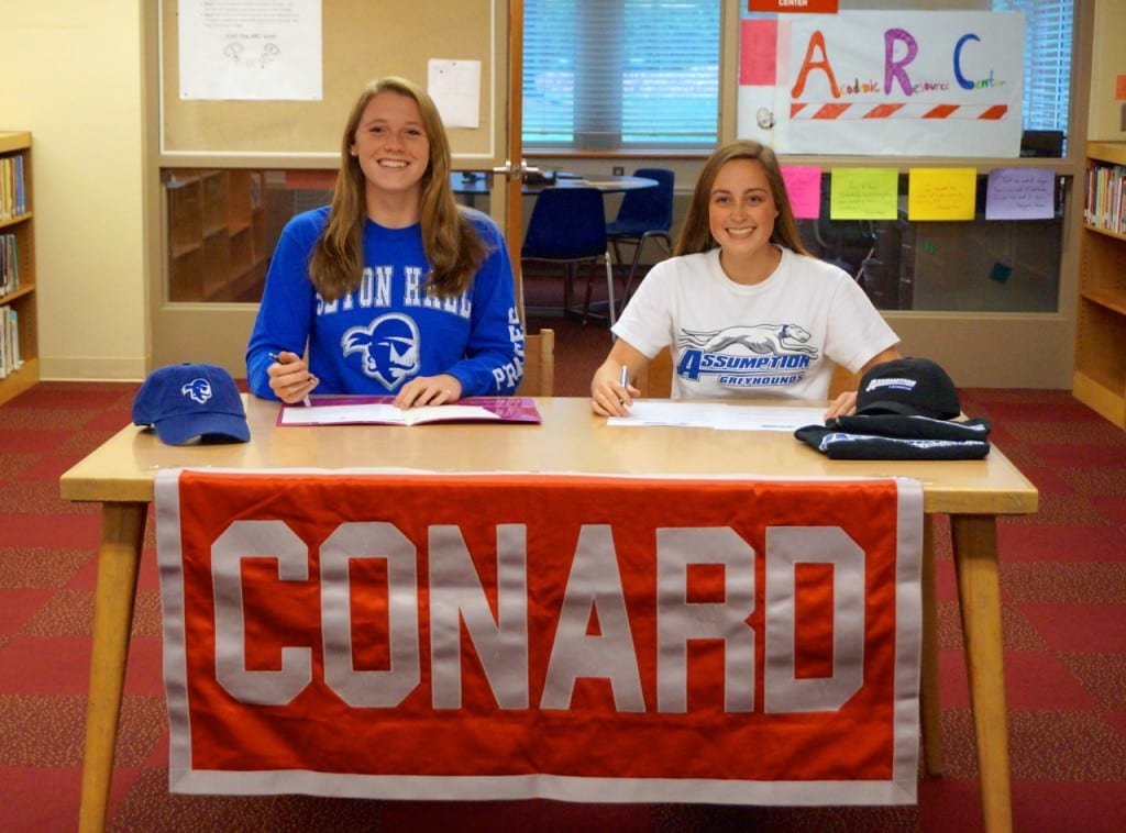 Conard seniors Clara Capone (left) and Marissa Haverty signed Letters of Intent to play college athletics on Nov. 11, 2015. Photo credit: Ronni Newton