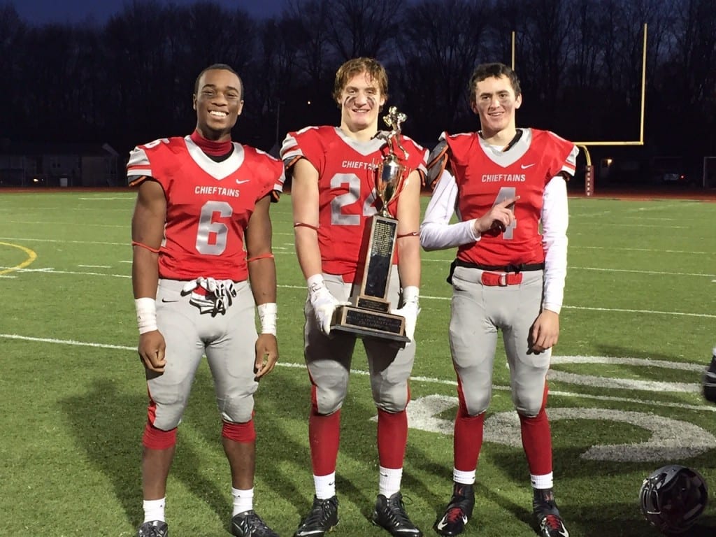 Conard captains (from left) Nate Richam, Bobby Iwerson, and Jack Ryan. Annual Conard vs. Hall West Hartford Mayor's Cup football game. Nov. 21, 2015. Photo credit: Ronni Newton