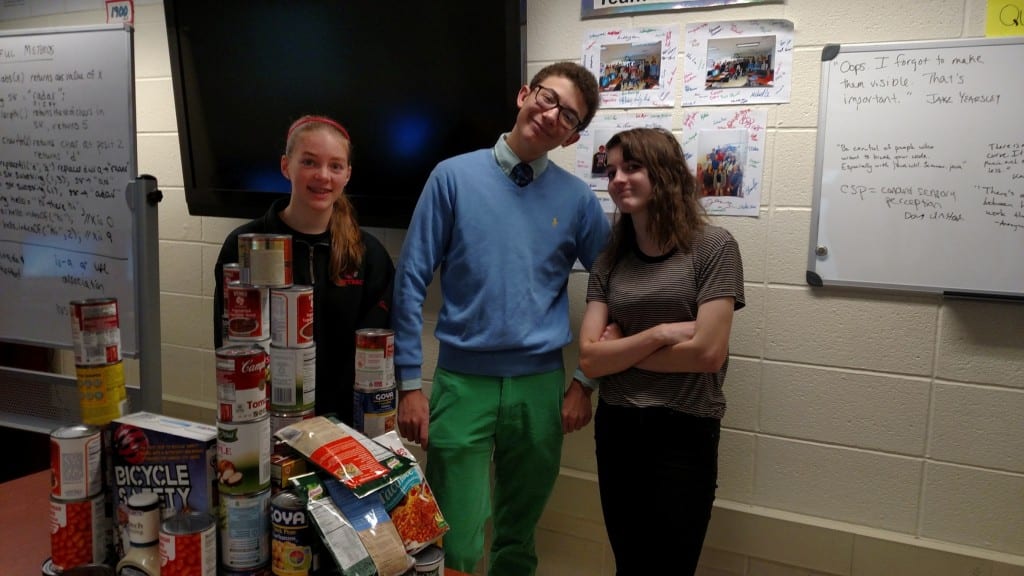 Conardl students with donated food for the 'West Hartford Gives Back' food drive. Submitted photo