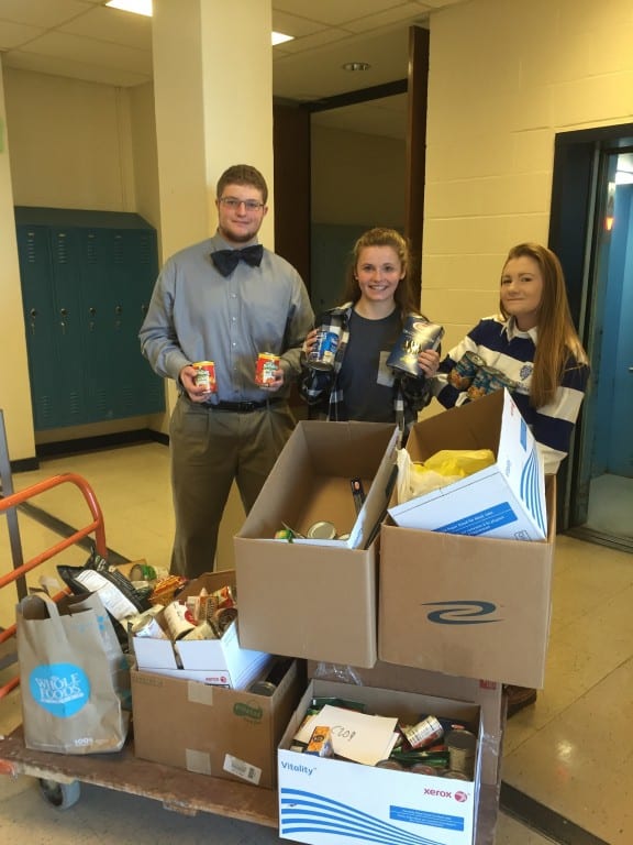Hall students with donated food for the 'West Hartford Gives Back' food drive. Submitted photo