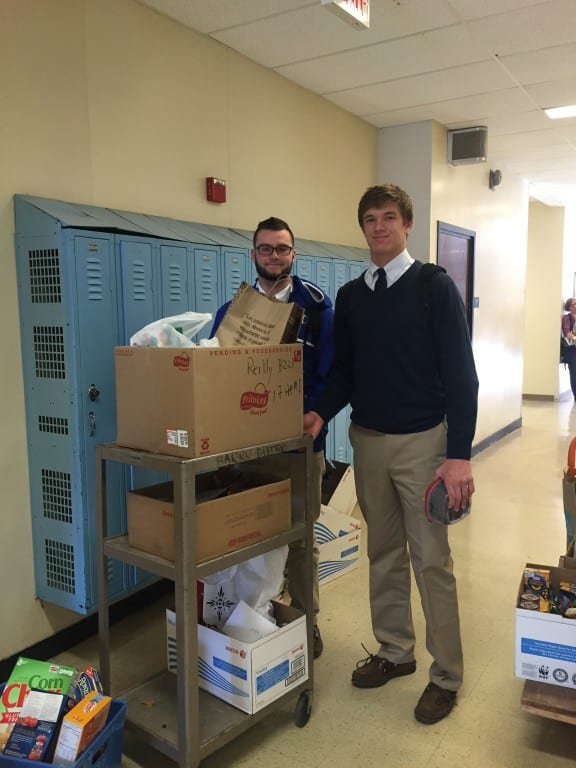 Hall students with donated food for the 'West Hartford Gives Back' food drive. Submitted photo