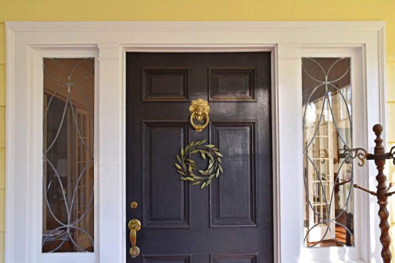The front door of the Beers home with it traditional lion head door knocker. Photo credit: Deb Cohen