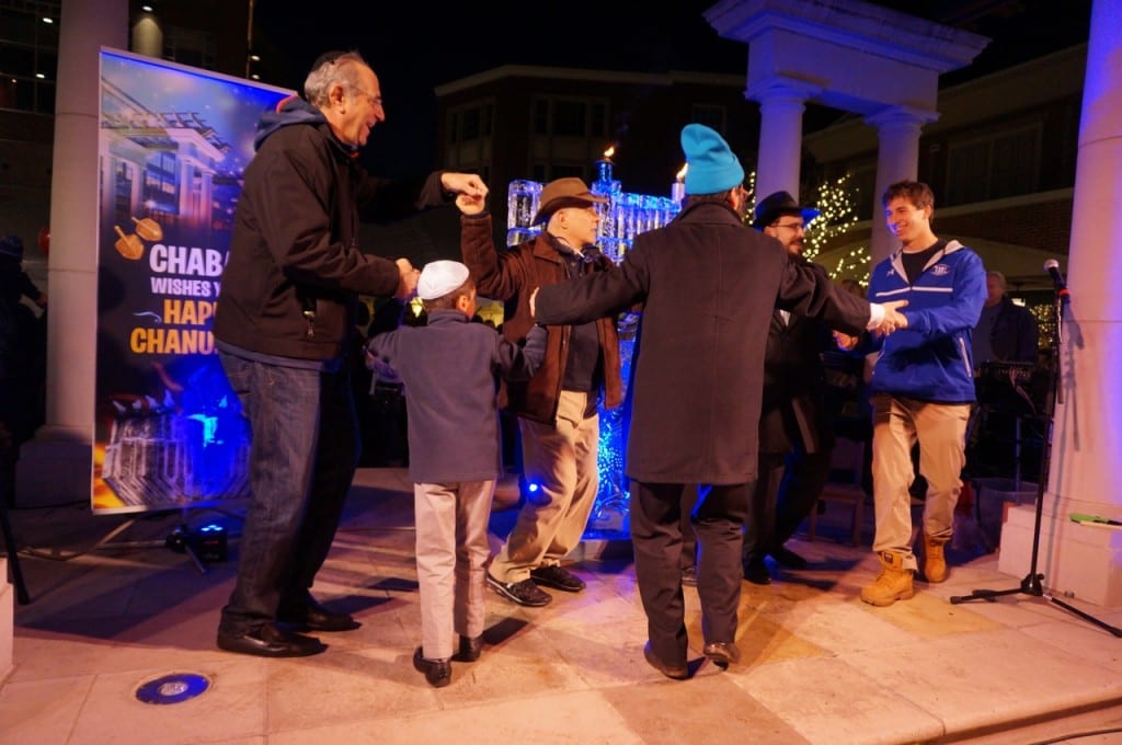 Members of the human chain dance after the menorah lighting. Chabad of Greater Hartford's 'Fire on Ice,' Dec. 6, 2015. Photo credit: Ronni Newton