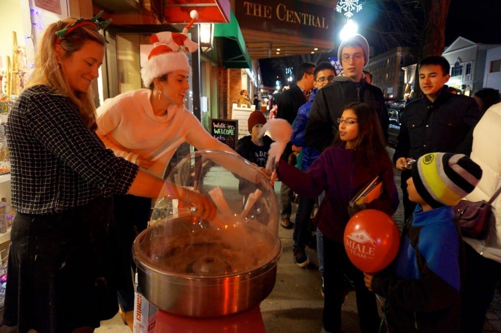 Silver Dahlia staff handed out freshly spun cotton candy. West Hartford Holiday Stroll, Dec. 3, 2015. Photo credit: Ronni Newton