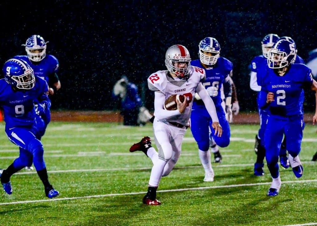 Declan Flaherty's 12-yard TD run in the third quarter gave Conard its only points in the game. Photo credit: Andrew Stabnick, Low Tide Photography