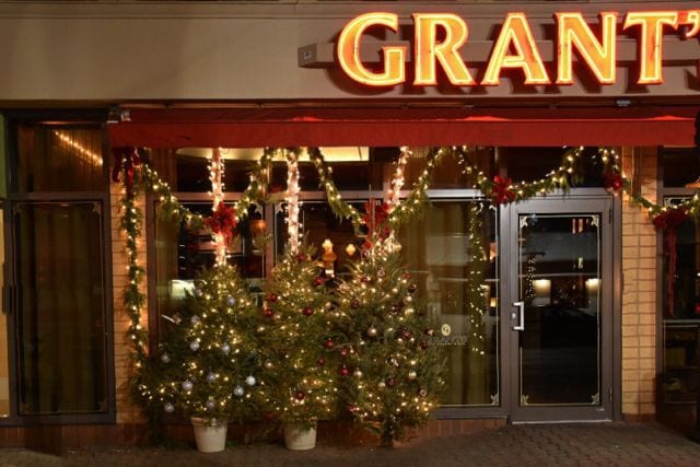 A row of Christmas trees welcomes guests to Grant's. Photo credit: Deb Cohen