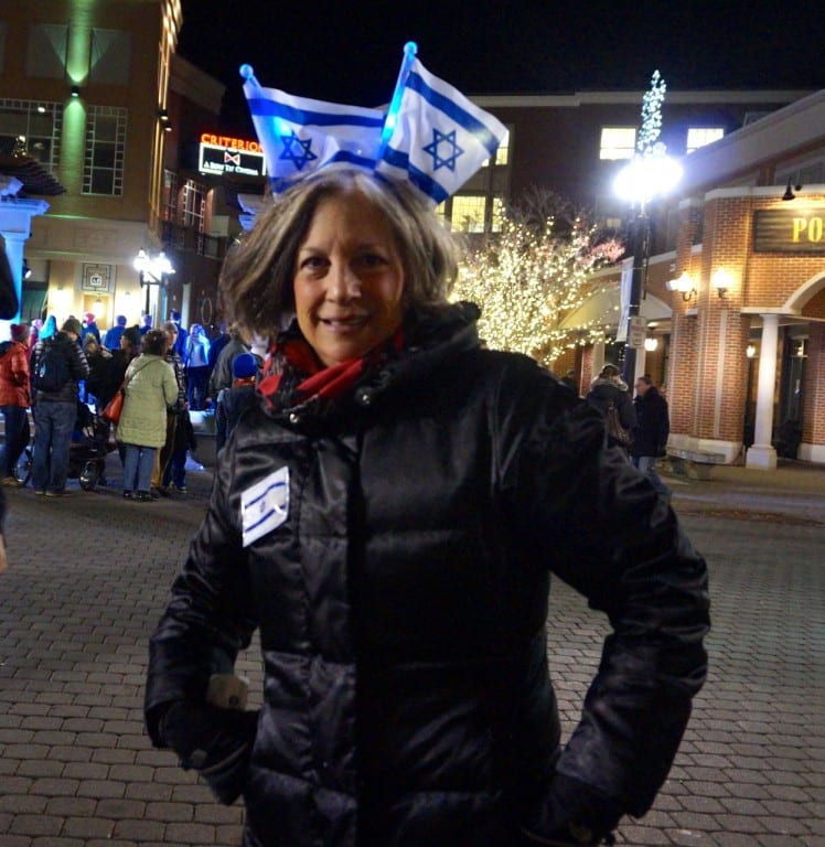 Harriet Dobin from the JCC shows off her unique "headband." West Hartford Holiday Stroll, Dec. 3, 2015. Photo credit: Ronni Newton