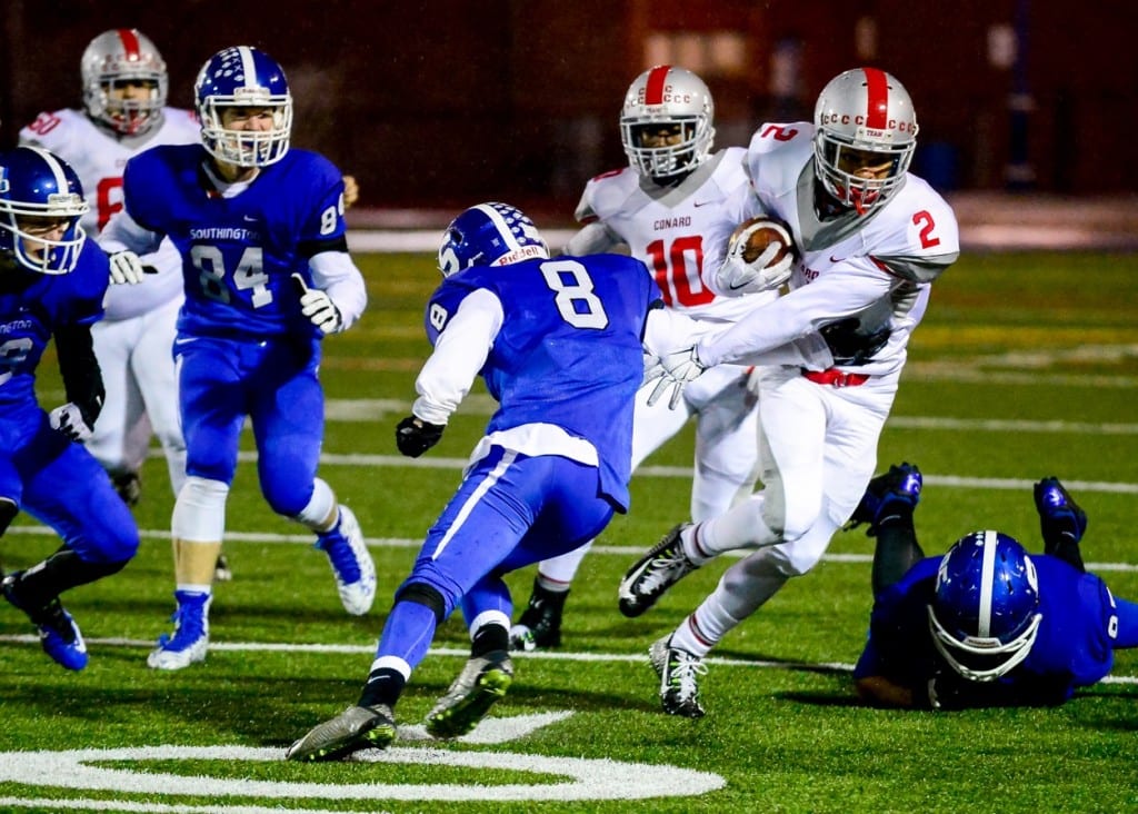 Conard's Byron Jones works to get by Southington's Austin Morin. Photo credit: Andrew Stabnick, Low Tide Photography