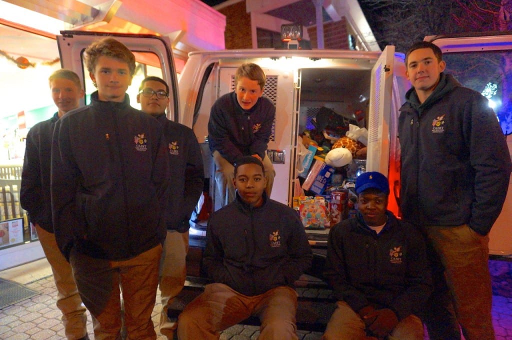The West Hartford Police Cadets held a "Stuff a Cruiser" event outside Toy Chest to benefit Connecticut Children's Medical Center. West Hartford Holiday Stroll, Dec. 3, 2015. Photo credit: Ronni Newton