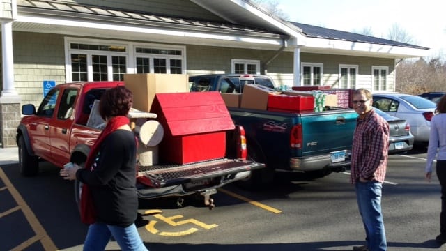 Two truck-loads of pet supplies were delivered by Jade Marketing Group employee Jordan Witik to shelters on December 12. submitted photo